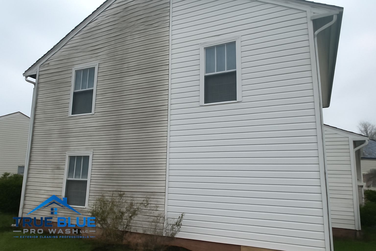 Commercial storefront exterior being soft washed in New Castle Delaware