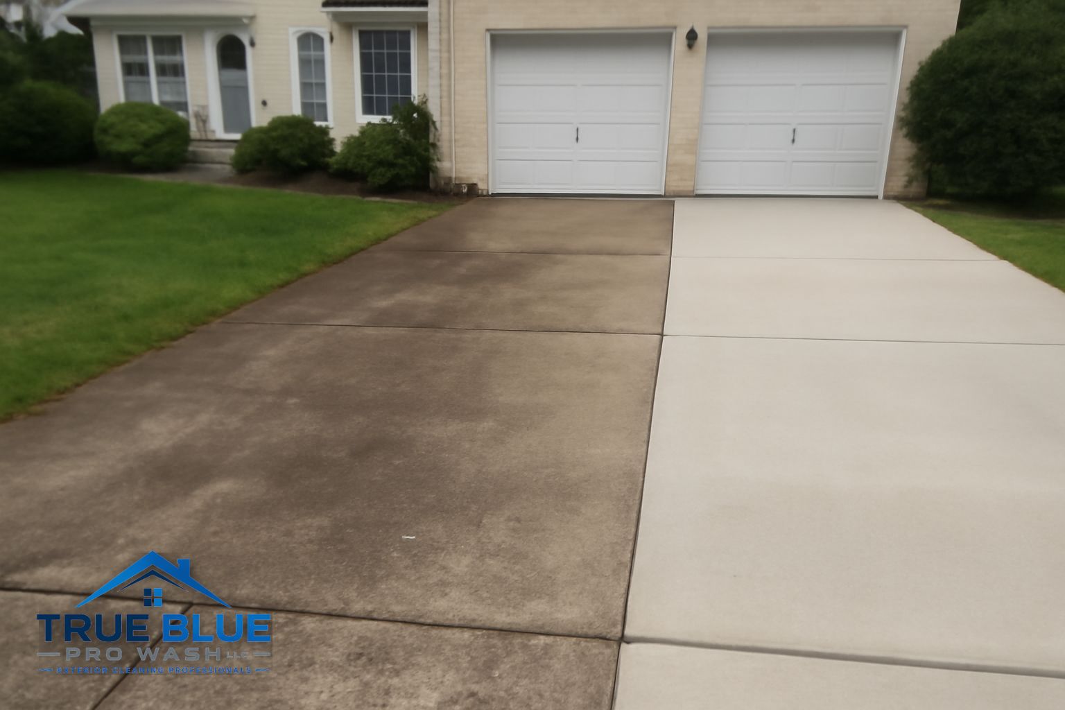 Pressure washing technician cleaning a concrete driveway in Hockessin Delaware
