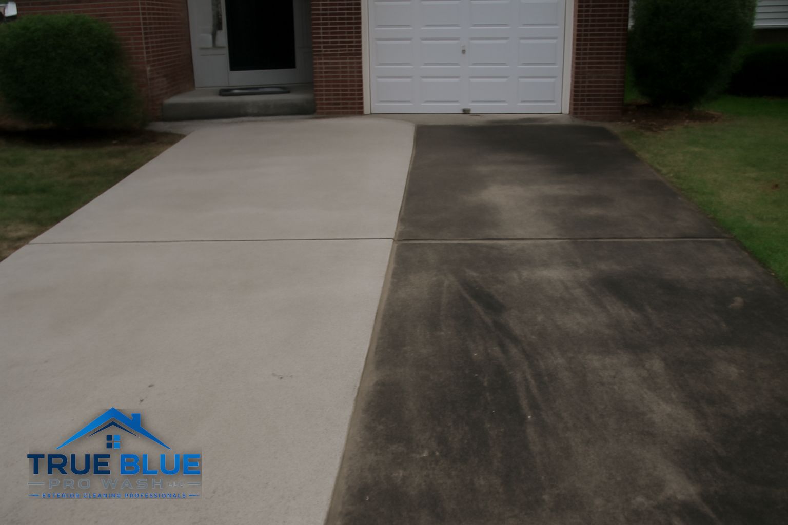 Cleaned concrete driveway and walkway at a residential home in Chester County Pennsylvania