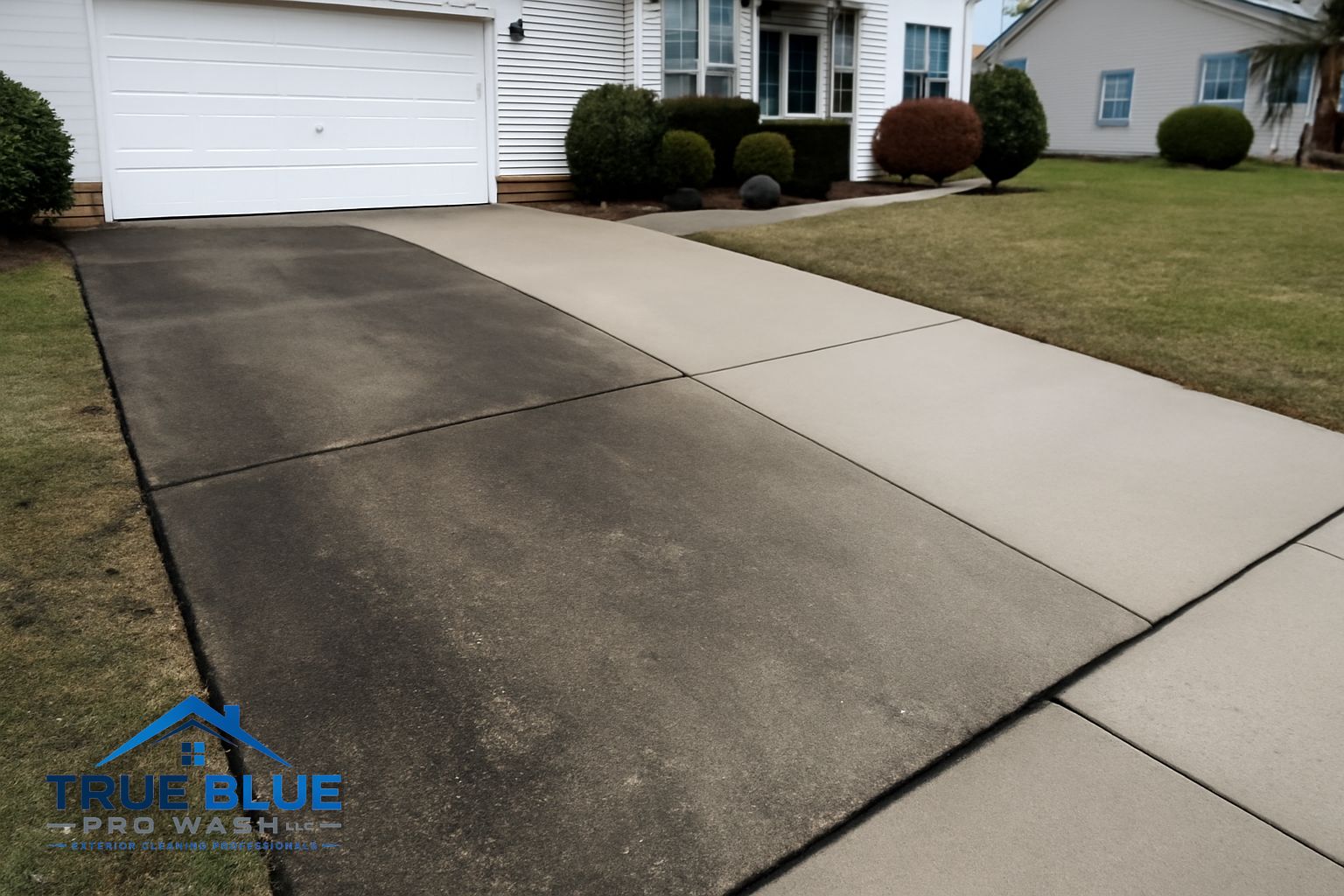 Clean concrete driveway and front walkway at a Delaware home after professional pressure washing