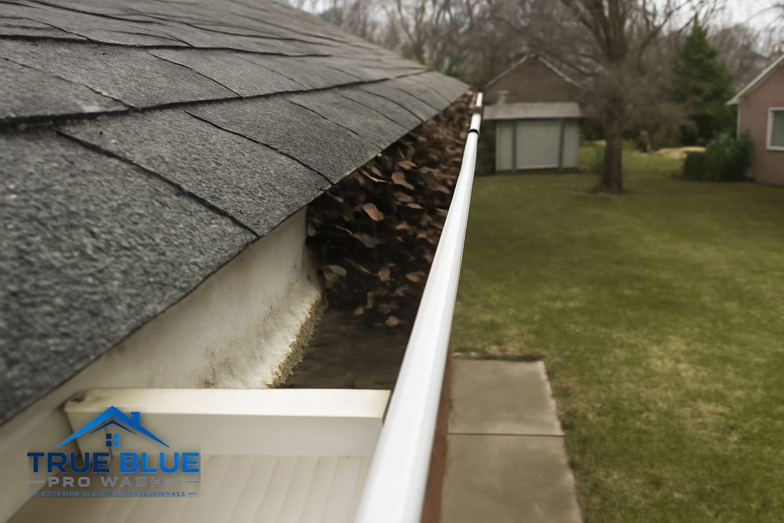 Gutter downspout flush on a colonial home in Greenville Delaware to confirm clear drainage