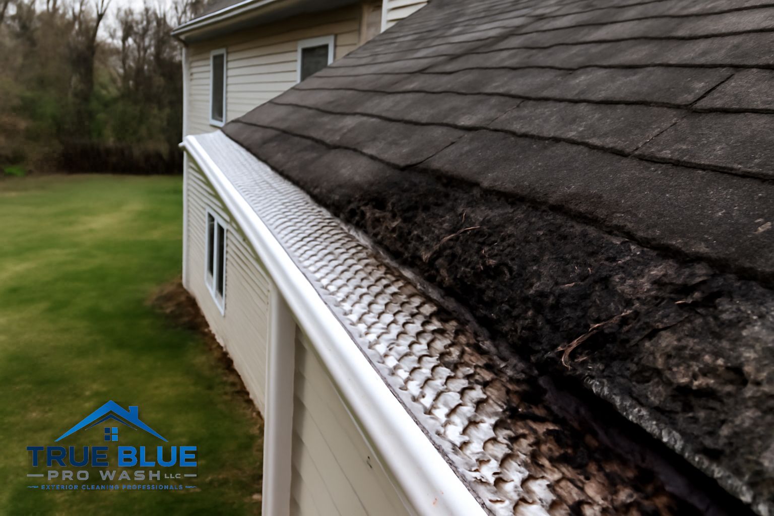 Gutter guard installation on a wooded Chester County PA home to prevent leaf debris buildup