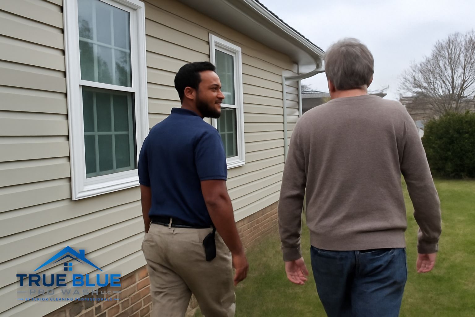 Before and after soft washing on a vinyl sided home in Bear Delaware showing clean bright siding