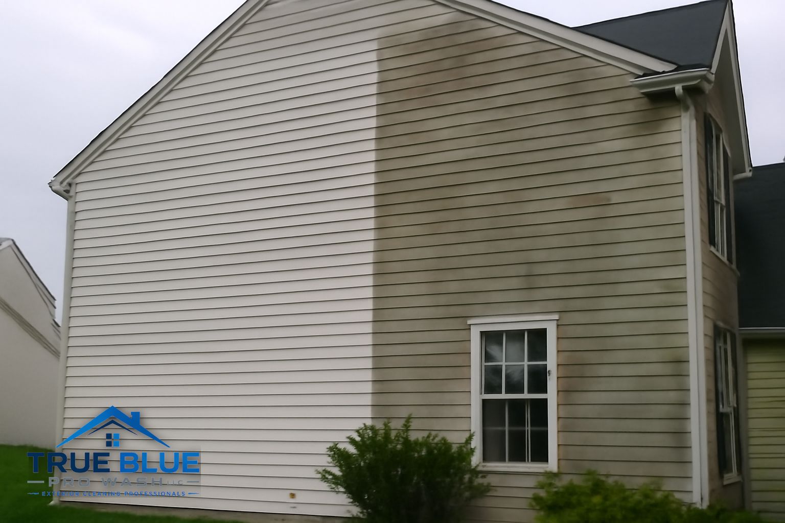Before and after soft washing a two-story home exterior in Southeast Pennsylvania