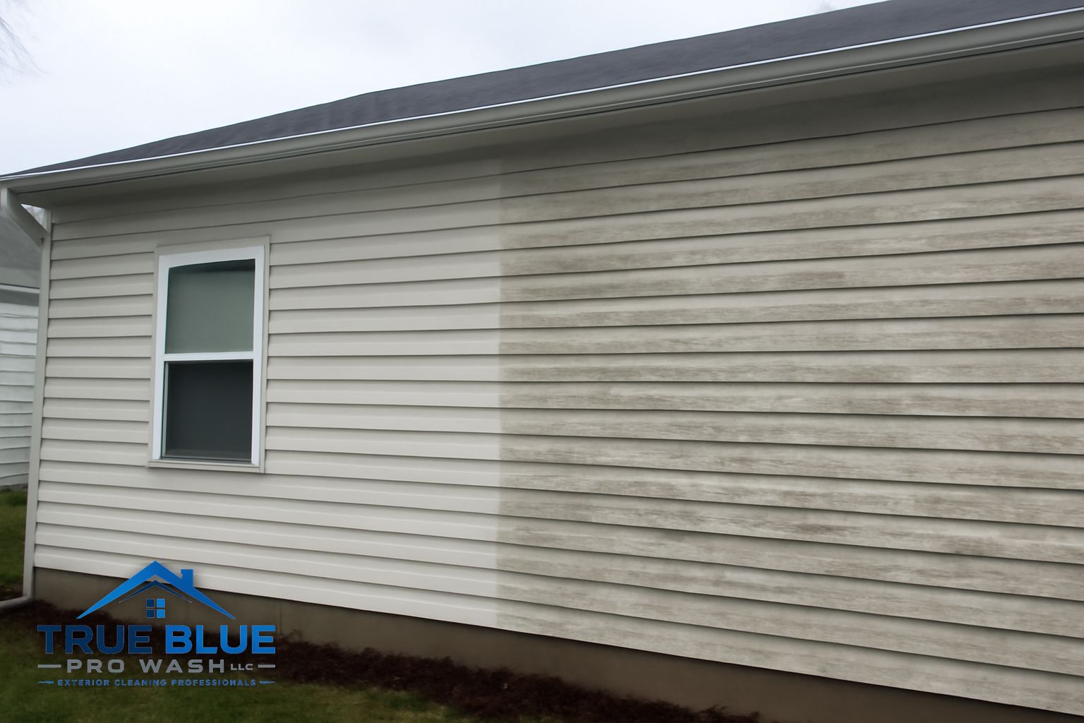 Before and after soft washing a Delaware home showing removal of green algae and grime