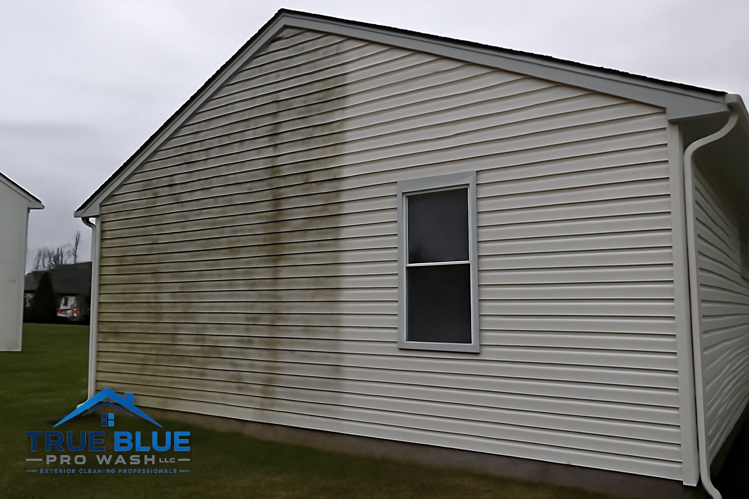 Before and after view of a clean home exterior after soft washing in New Castle Delaware 19720