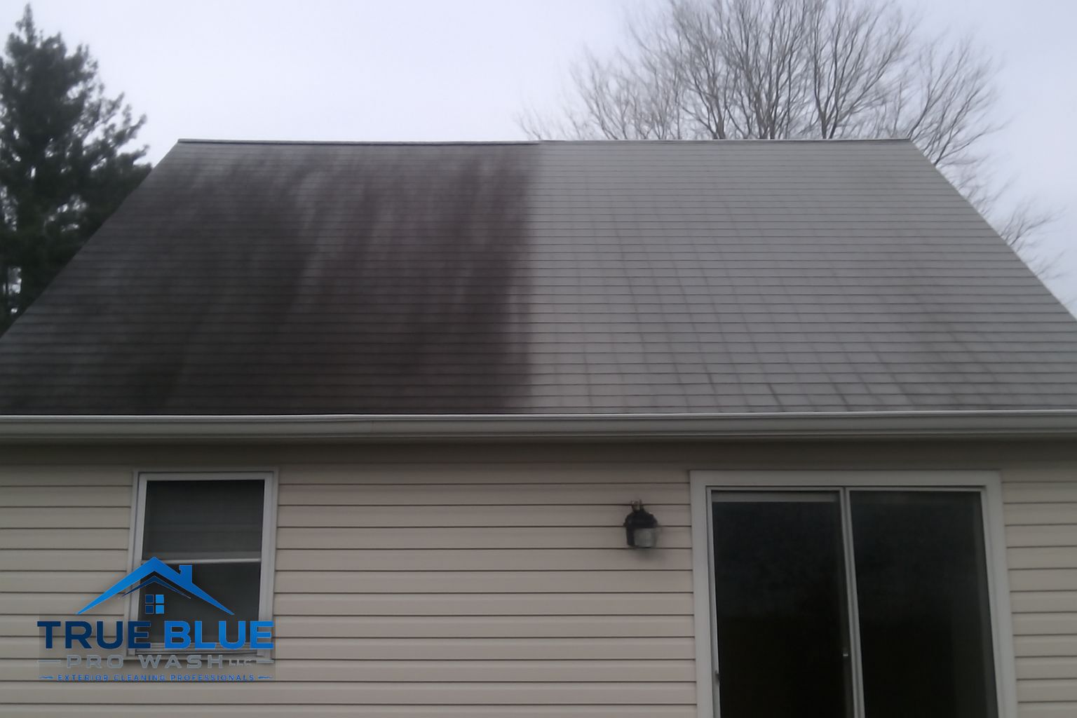 Soft wash equipment setup for roof algae and moss removal on a residential home in West Chester Pennsylvania