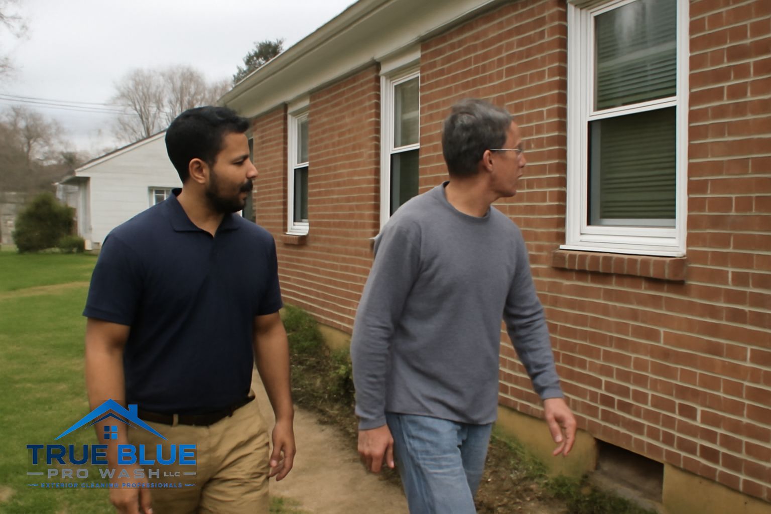 Gutter brightening treatment removing oxidation tiger stripes from aluminum gutters on a Wilmington home