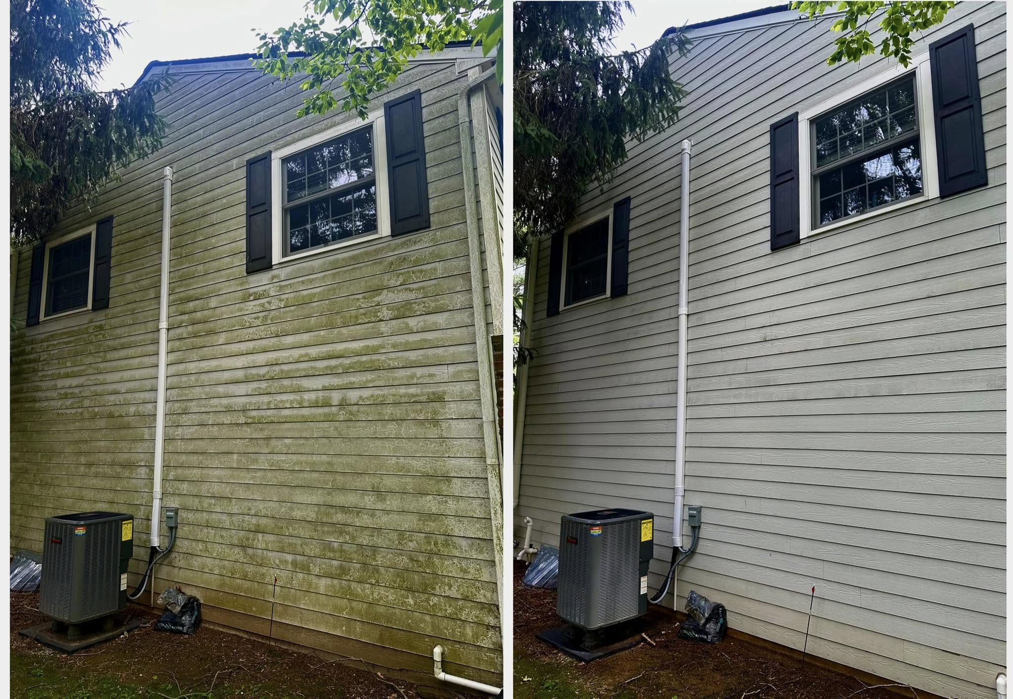 Soft washing a stone and stucco home near Chadds Ford PA